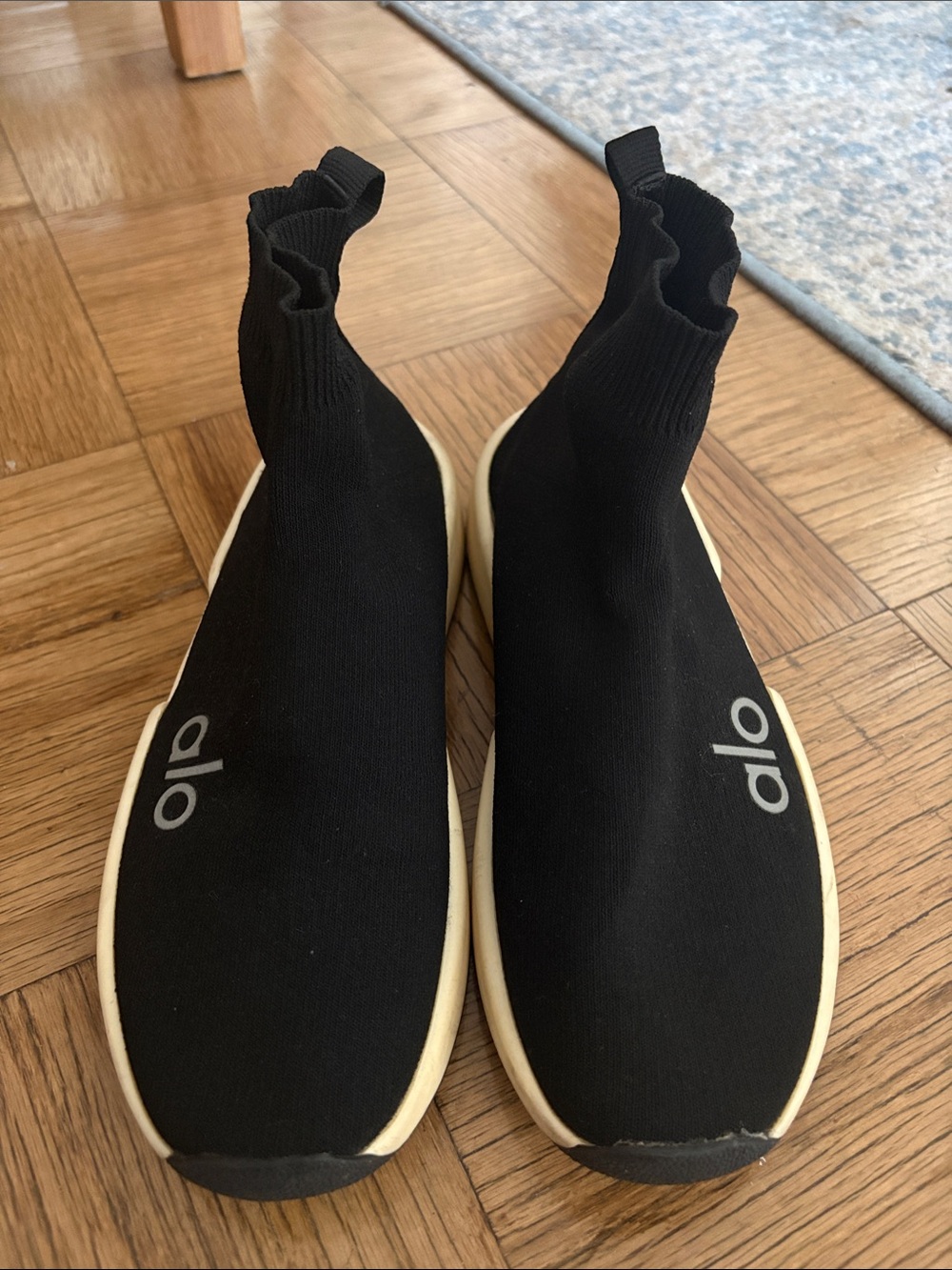 ALO Yoga Women’s Black Knit Slip-On Sock Sneakers with Cream Sole